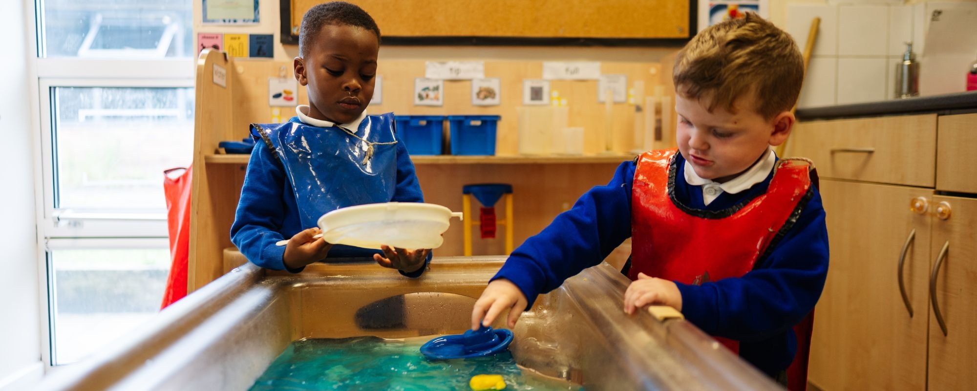 Header image showing children playing